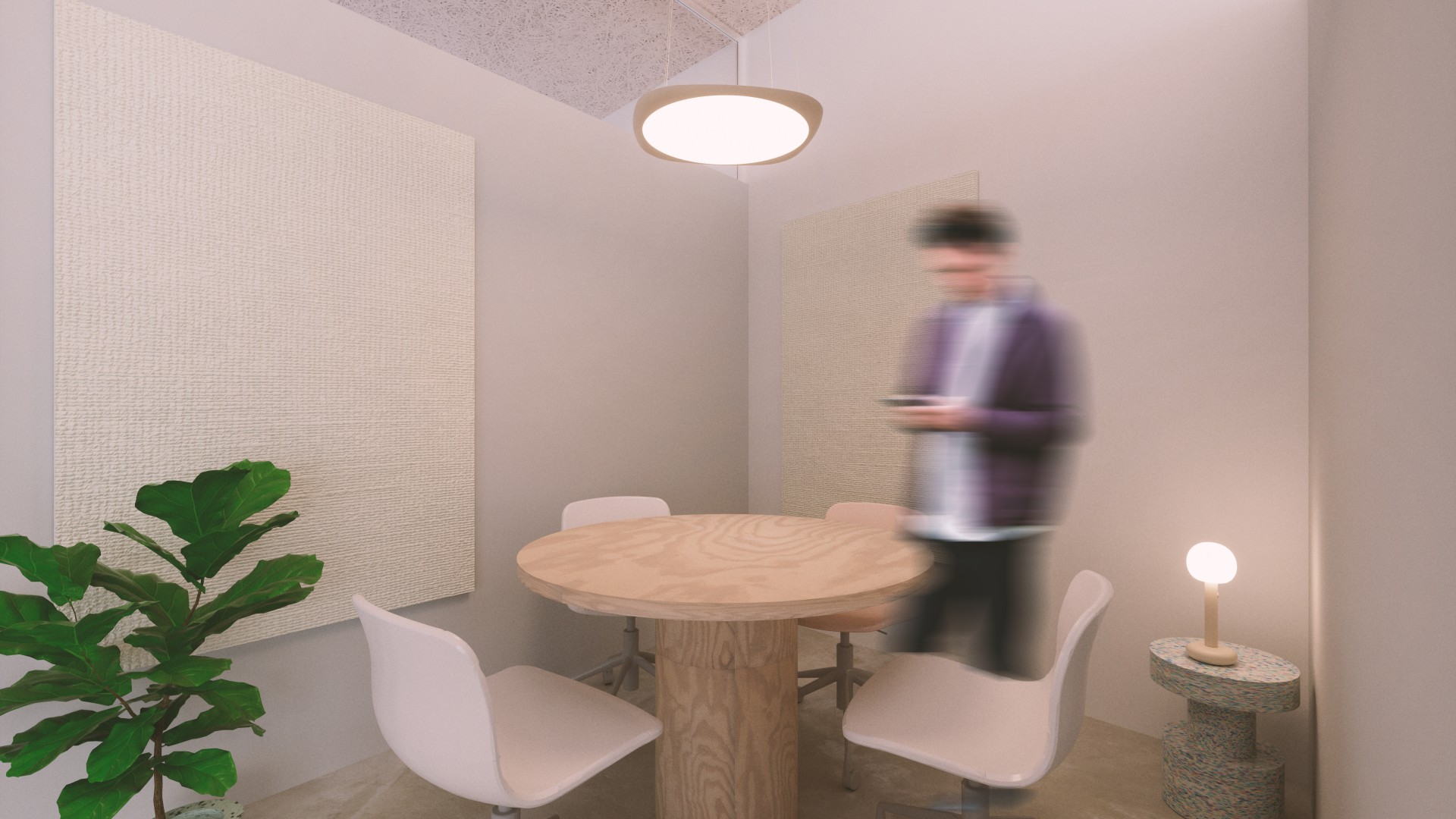 Runder Holztisch mit vier wei&szlig;en B&uuml;rost&uuml;hlen auf Rollen in einem kleinen Besprechungsraum, Pflanze und Stehlampe